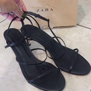 Black sandals.